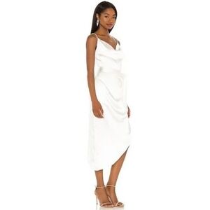 melissa halter maxi dress elliatt Effortless elegance in the South of France @anna.berkman embodies timeless style in the Melissa Halter Maxi Dress. Crisp white, cascading frills, and delicate rose details